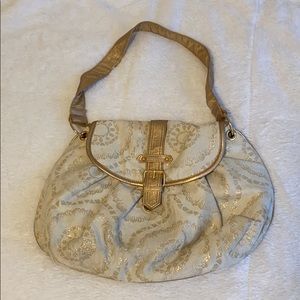 Ivory and gold purse